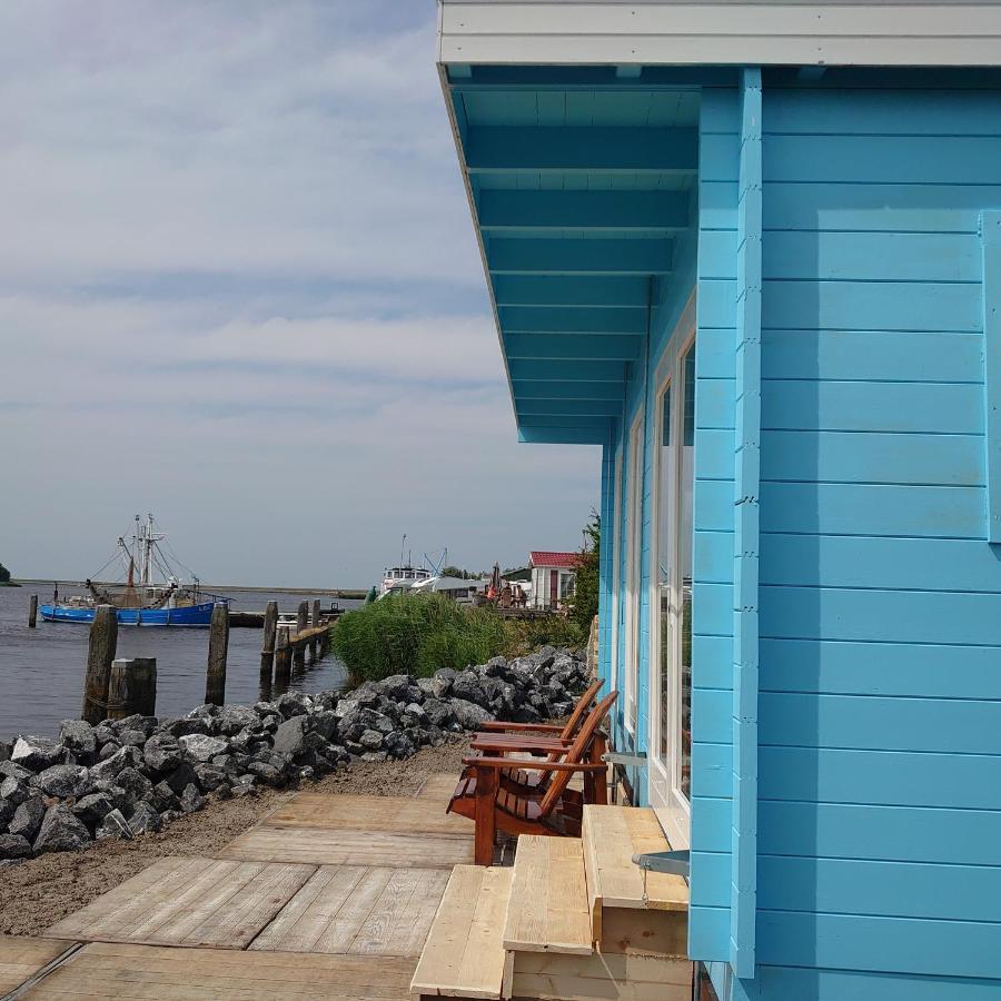 Waterhuisjes Op De Pier Van Lauwersmeerplezier! Lauwersoog Exteriör bild